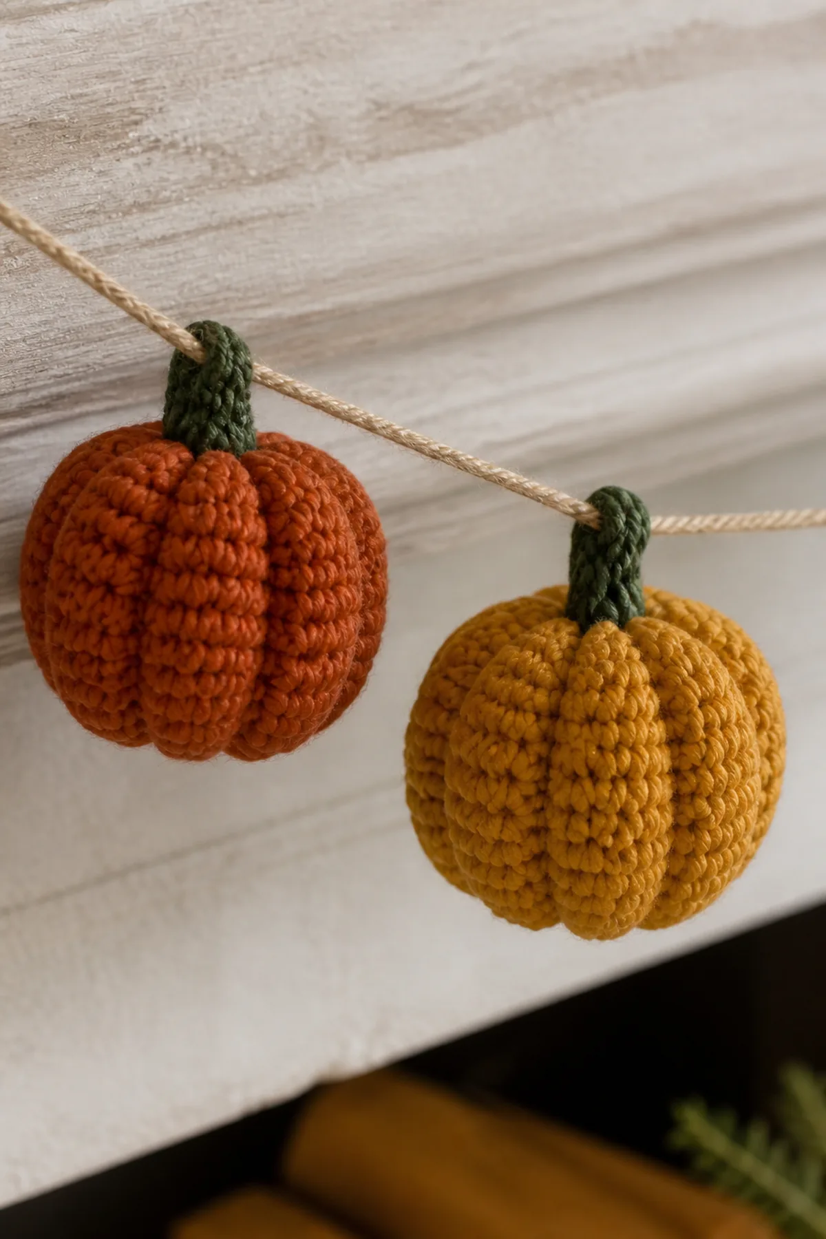 Close-up of the stitch texture and finishing details on easy crochet pumpkin garland