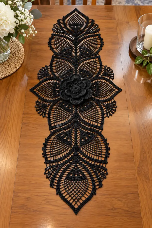 Finished elegant black crochet lace floral table runner with layered rose and pointed leaves