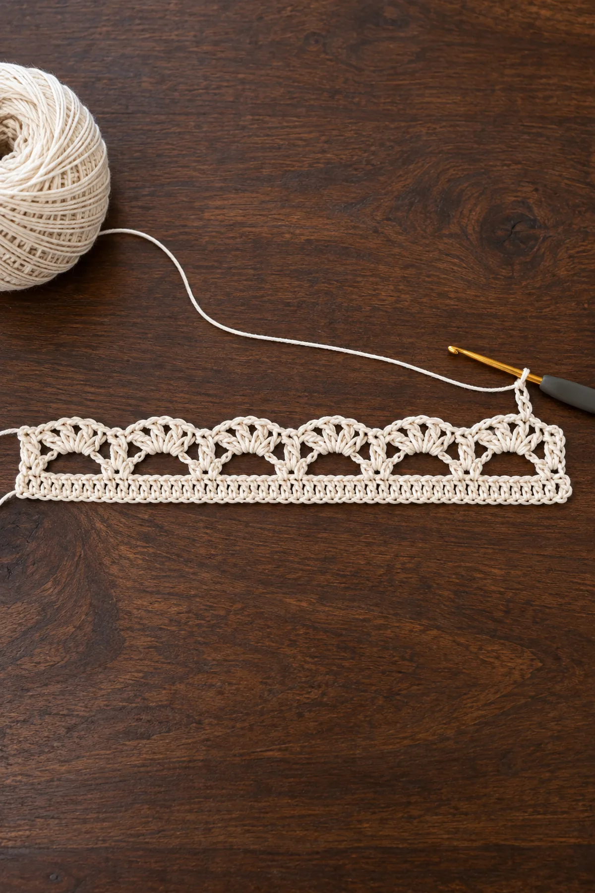 Ivory 73 stitch crochet lace runner foundation with first open window row in progress