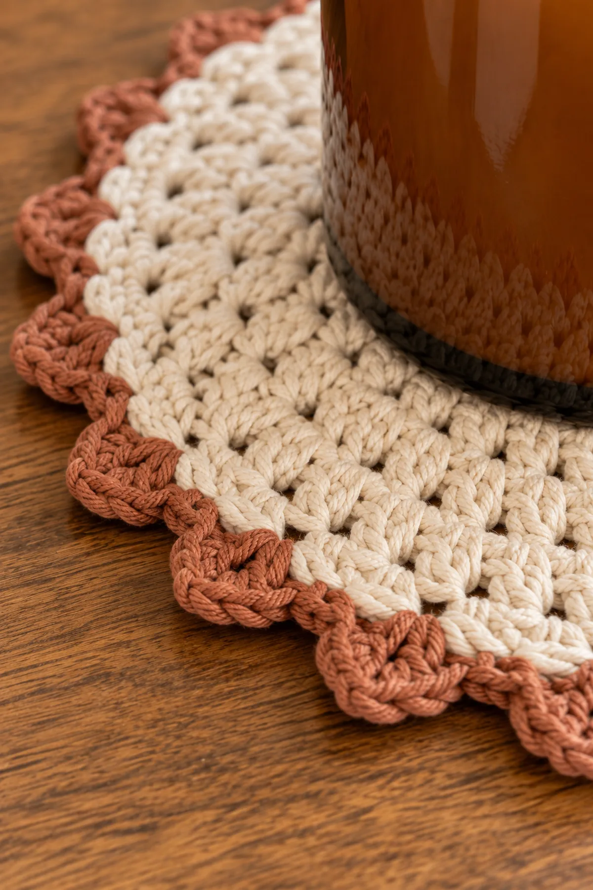 Close-up of stitch texture and finishing details on crochet mini candle jar mat