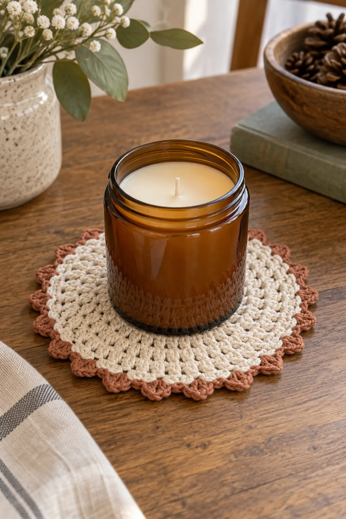 Finished crochet mini candle jar mat displayed with a clean handmade finish