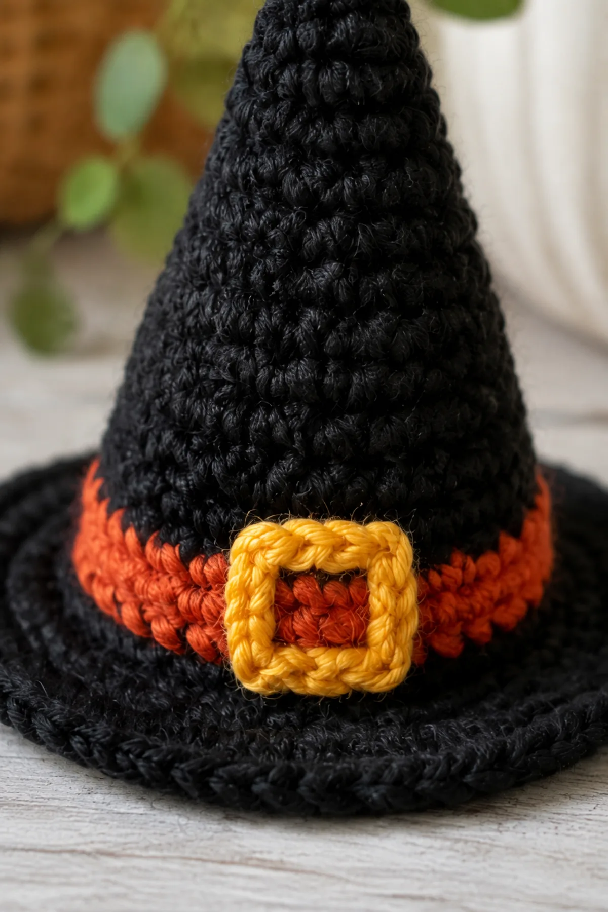 Close-up of the stitch texture and finishing details on easy crochet mini witch hat ornament