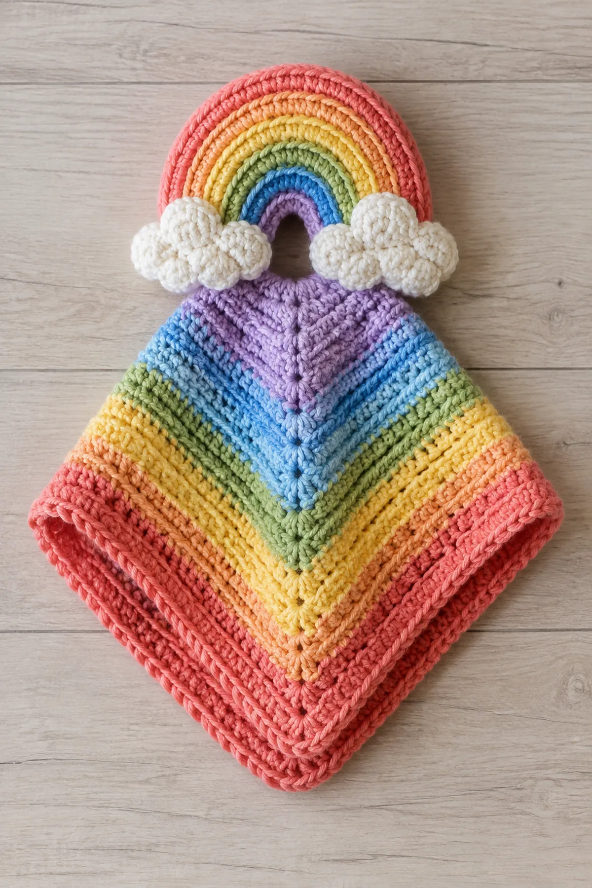 Finished easy crochet rainbow baby lovey displayed with a clean handmade finish