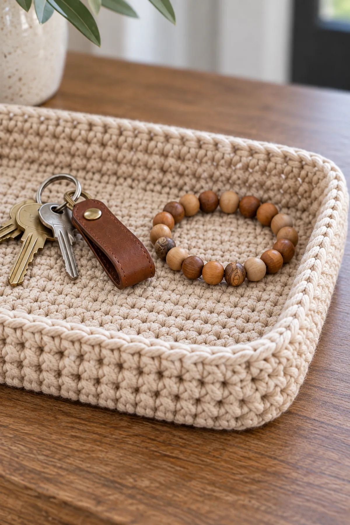 Close-up of stitch texture and finishing details on small crochet catchall tray basket